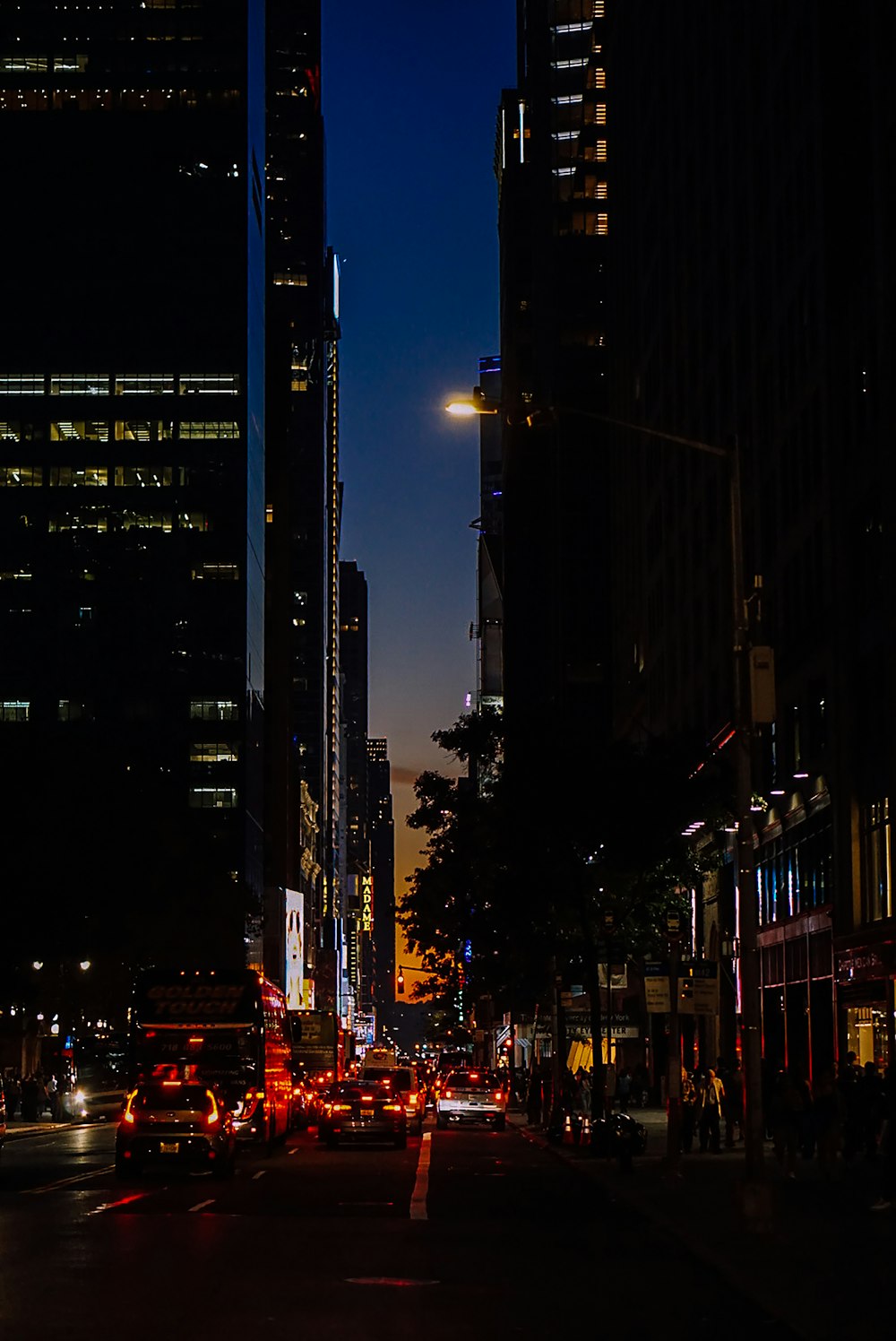 Manhattan avenue at dusk with taillights